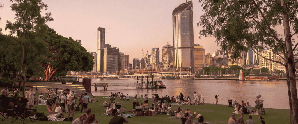 People having picnics by the Brisbane River