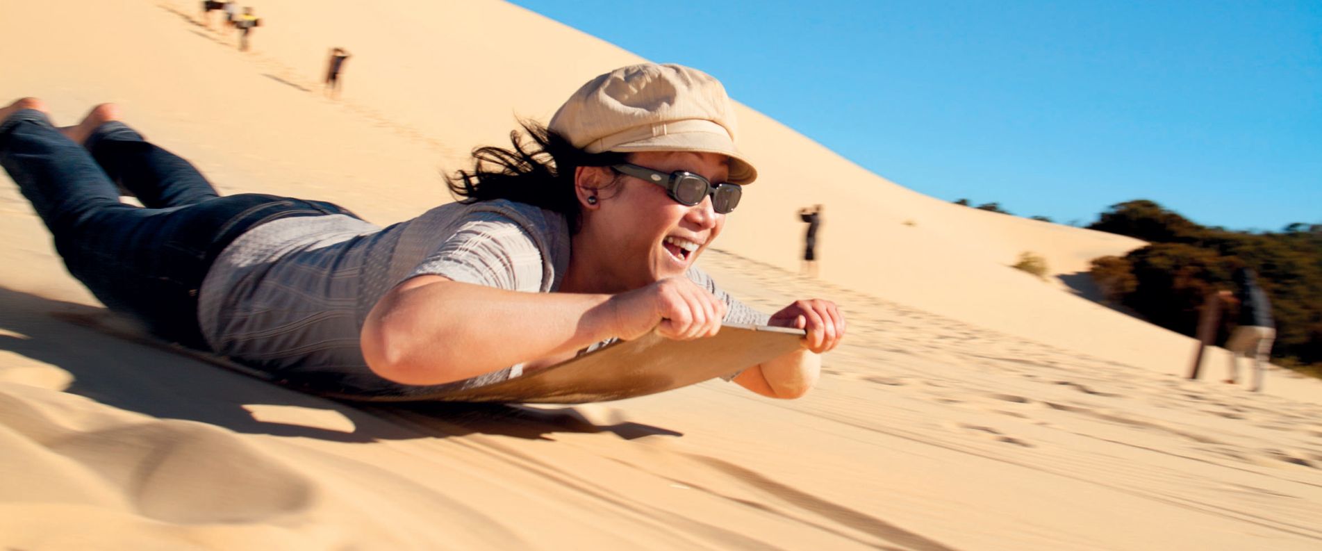 Woman sandboarding